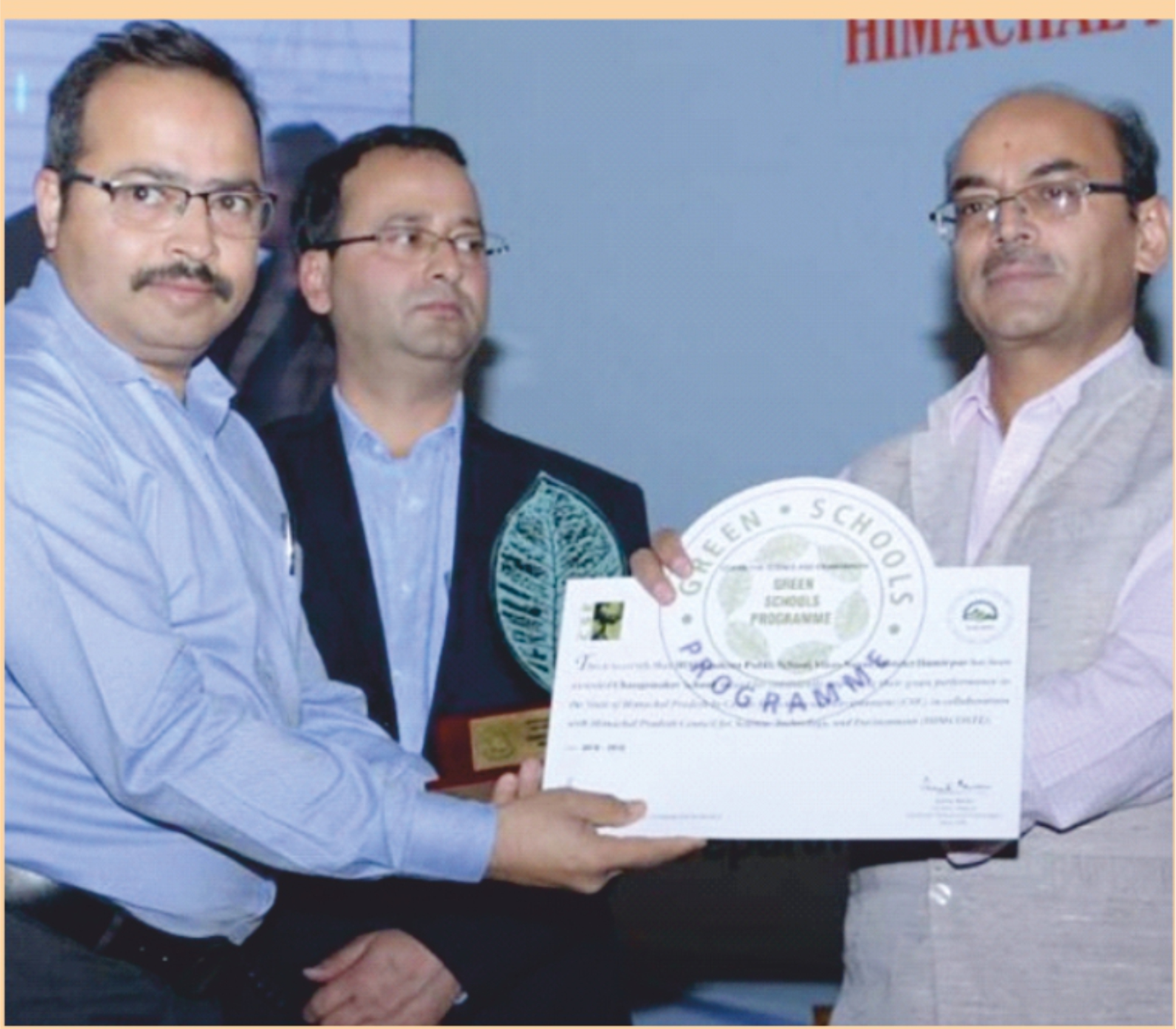 Director HAPS receiving Green School Award